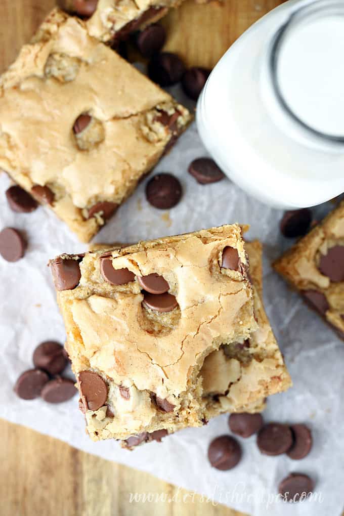 Blondie bars with chocolate chips and milk.