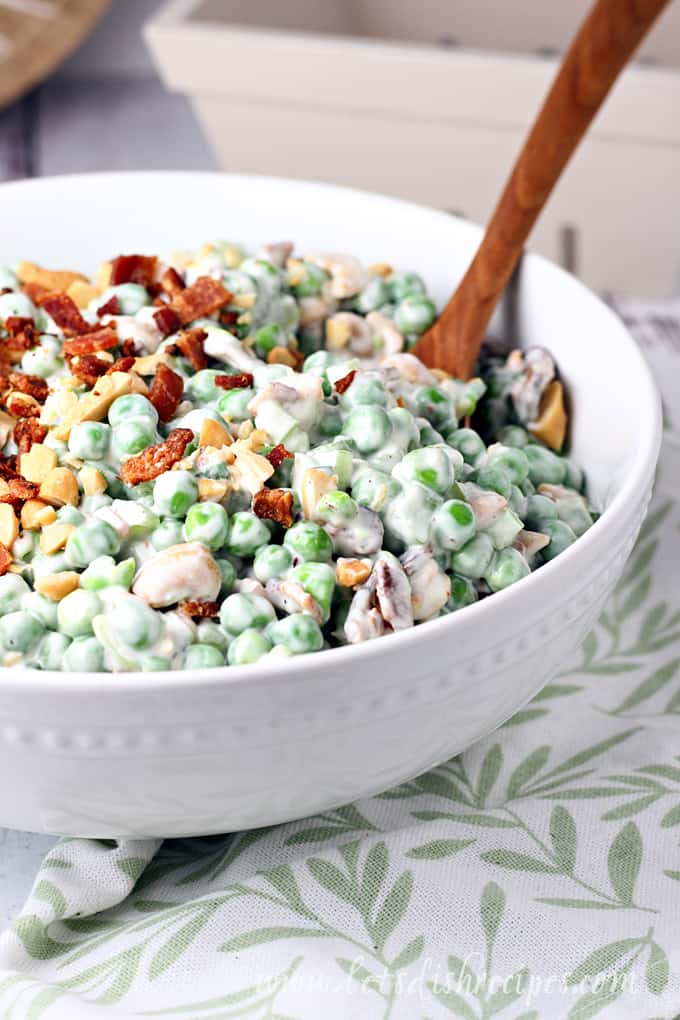 Pea salad with bacon, cashews, celery and a mayonnaise dressing.