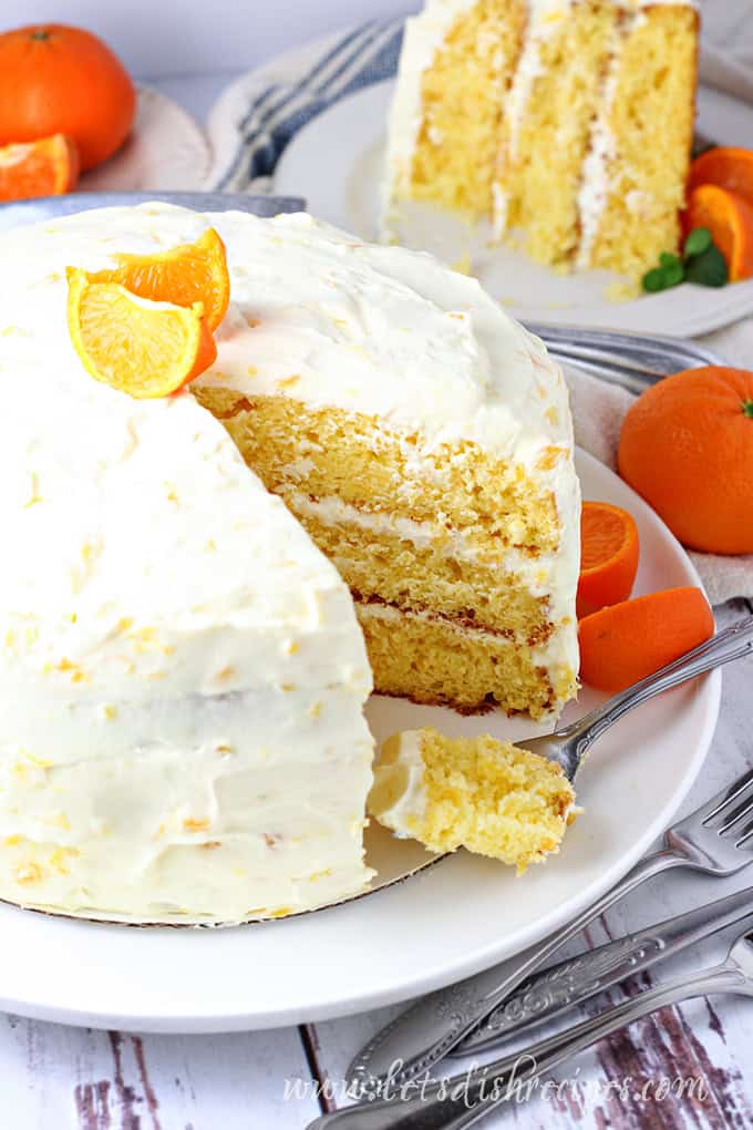 Three layer pineapple orange cake with whipped cream frosting.