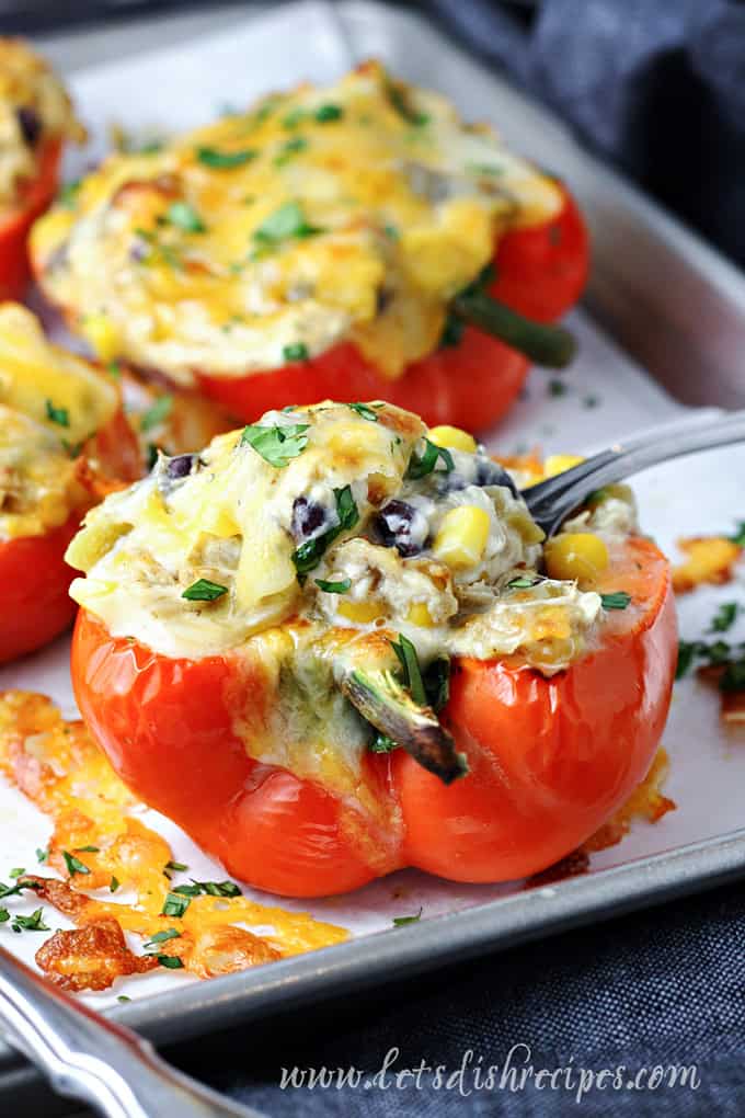 Red bell peppers stuffed with a mixture of chicken and cheese.